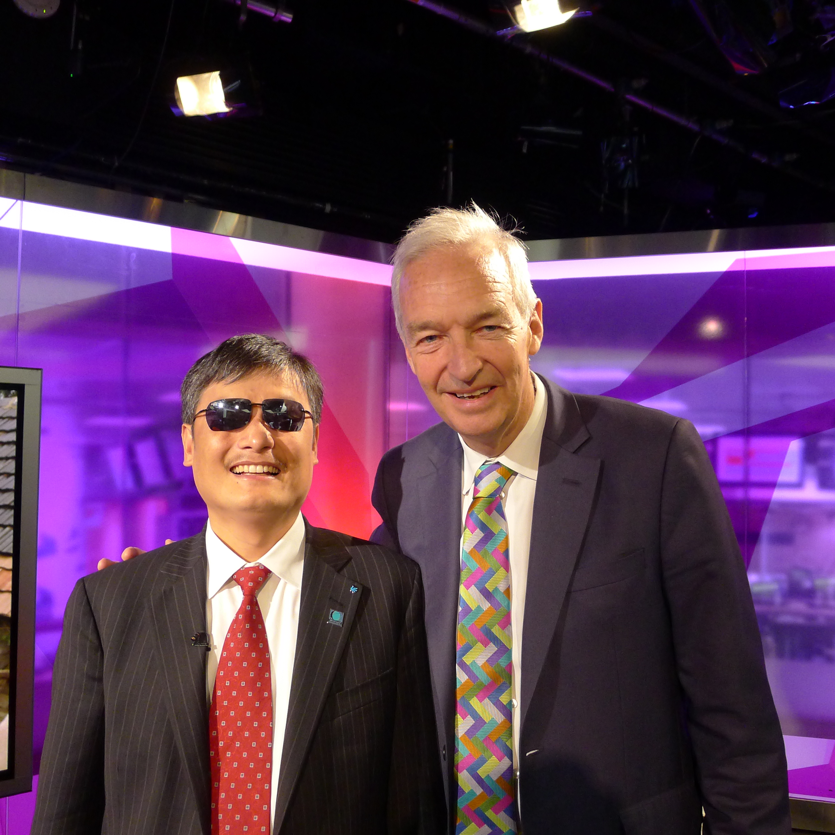 Chen was interviewed on national TV and radio - pictured here with Jon Snow of Channel Four news.