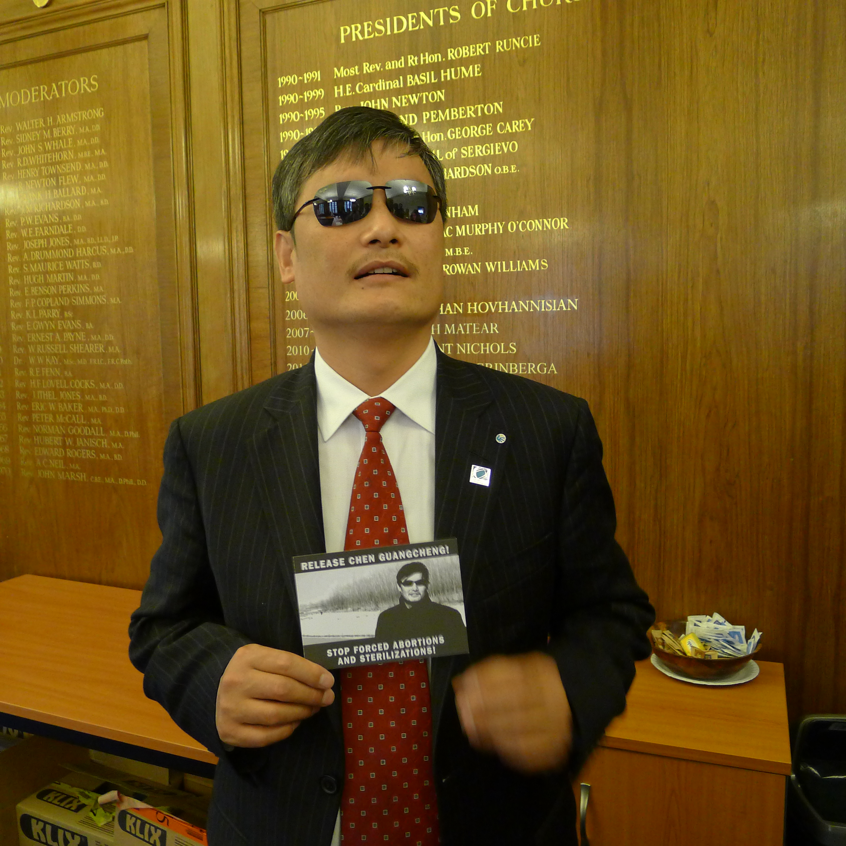 Chen Guangcheng holding one of the postcards produced by Jubilee Campaign and launched by David Alton and Danny Smith when Chen was sent to prison. Phyllis Bowman of Right To Life assisted with their distribution.