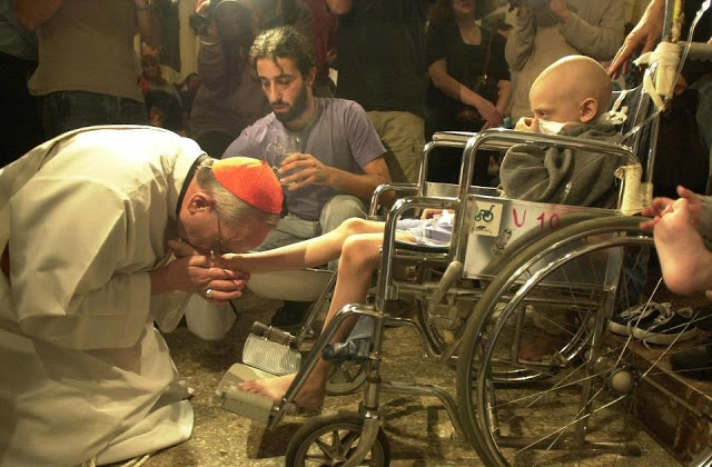 Pope Francis as Archbishop of Buenos Aires - places himself at the service of a disabled child