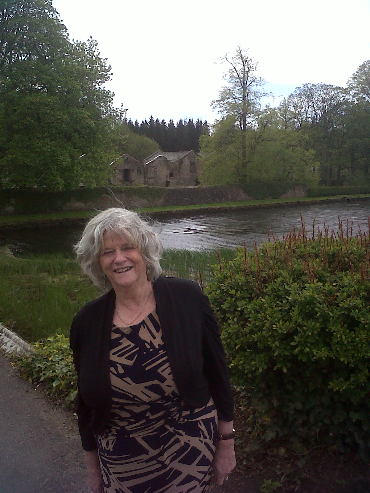 Project Patron, Rt.Hon. Ann Widdecombe with the old Mill Building (where the Visitors' Centre will be located)  in the background
