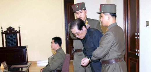 Chang Song Thaek is dragged into the court by uniformed personnel before being executed in the latest North Korean purge 