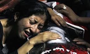 Coptic mothers in Egypt mourn the deaths of their daughters, killed as they attended a wedding in Cairo