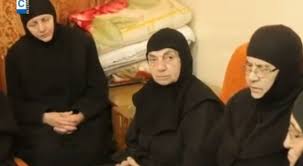 A new video of the abducted nuns has just appeared with their traditional cross removed from their habit.